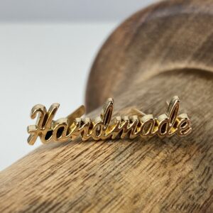 “Handmade” writing – Gouden Label