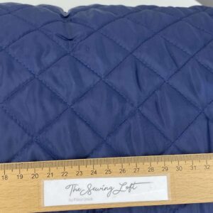 Navy- stepper mantelstof