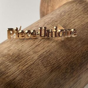 “Piece Unique” writing – Gouden Label