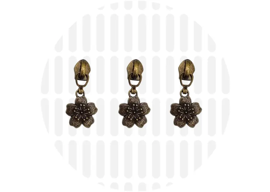 bloem met details - messing - schuiver voor SPIRAAL rits 6mm